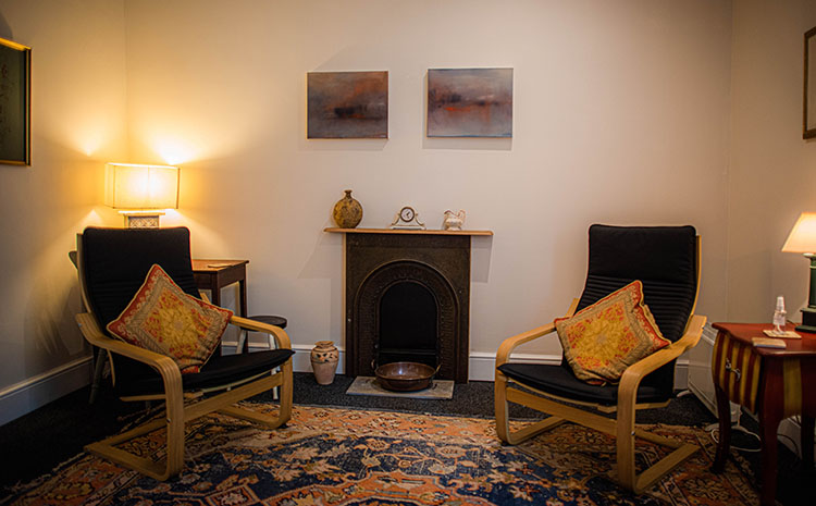 Therapy Room with chairs and a fireplace at The Practice Rooms in Richmond, London